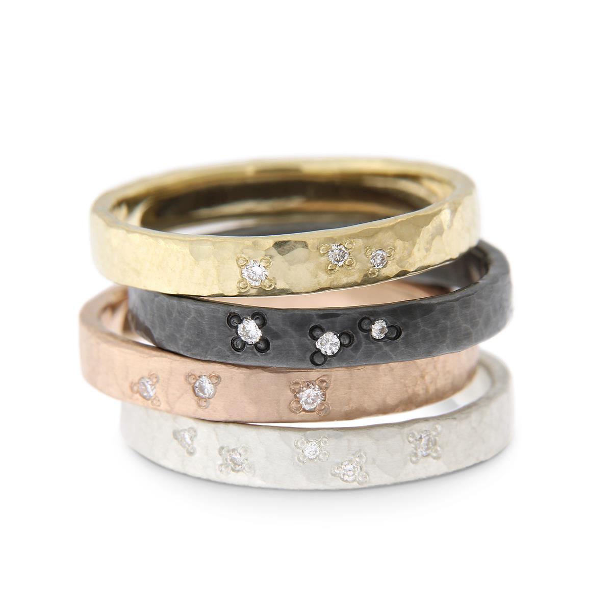 Katie g. Jewellery - Wide Hammered Rings with stargazing setting diamonds